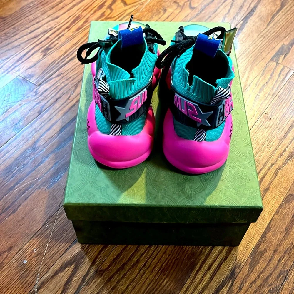 Hello Joy
Pink & Turquoise Sneakers with Black Shoestrings & flowers
Size 40 - Picture 3 of 3